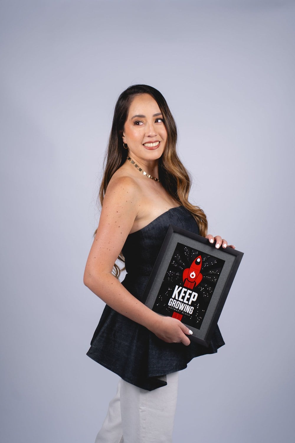 Lissy Tealdo con su reconocimiento Keep Growing